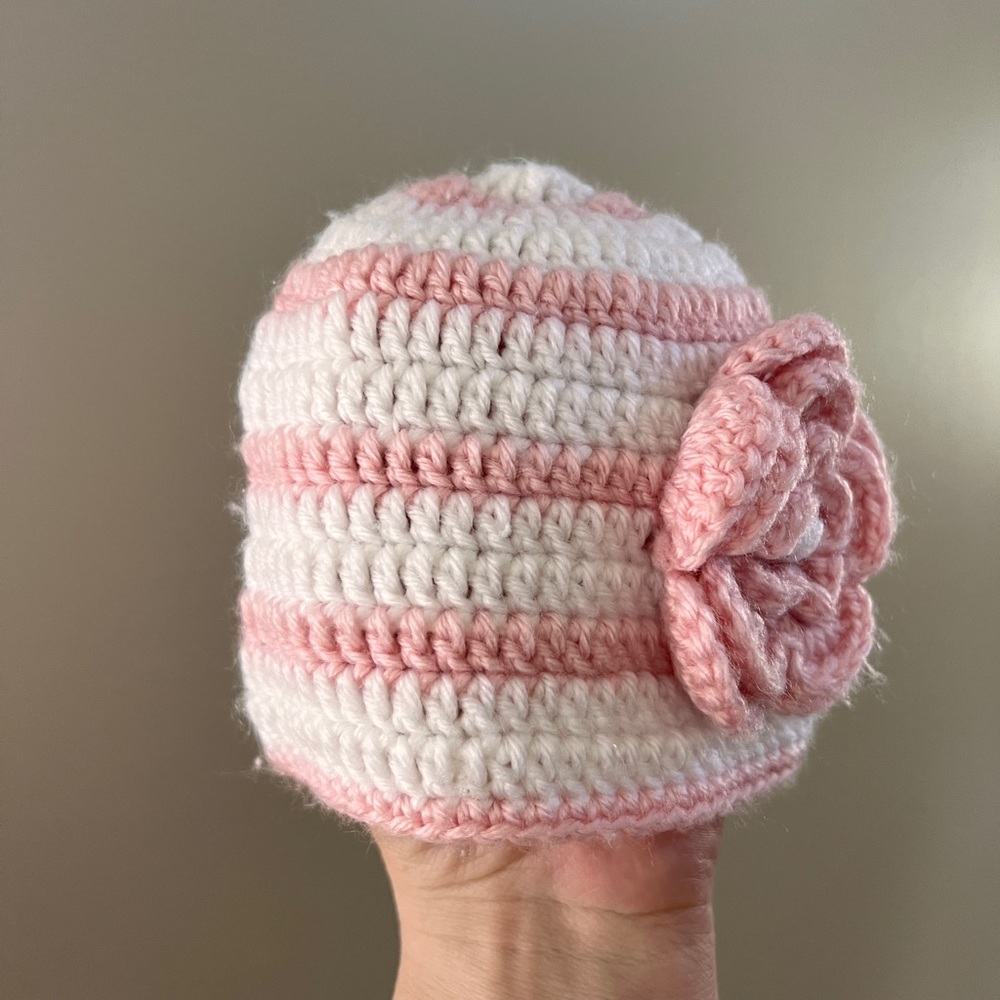 White and pink handmade knit hat for newborn baby girl